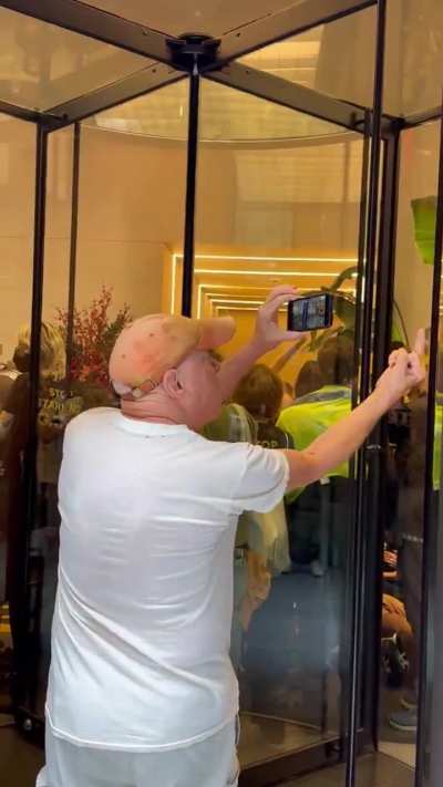 Crazy old guy gets mad at protestors and tells them they should be shot and raped