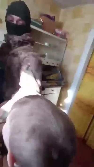 UA POV: Man resisting mobilization in Ukraine as wife and child look on.