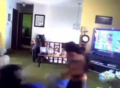 Kid gets beaten by another kid wearnign pants on his head