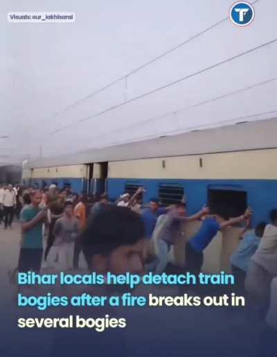 Bihar locals help detach train bogies after a fire breaks out in several bogies
