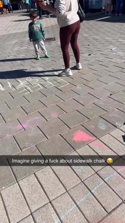 To try and erase street chalk