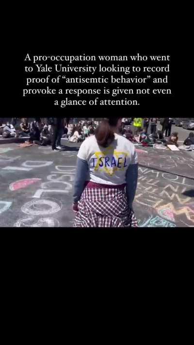 A pro-occupation woman who went to Yale University trying to provoke a response is given not even a glance of attention