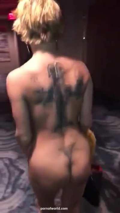 Busty Blonde Removes Dress In Hotel Hallway