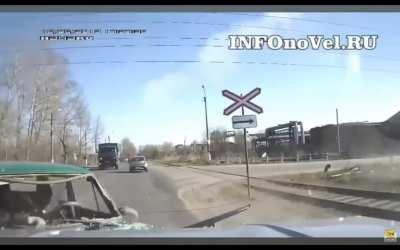 Russia: man breaks windsheild with his head after accident