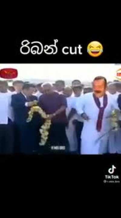 Sri Lankan President using a senior CCP official as a personal servant.