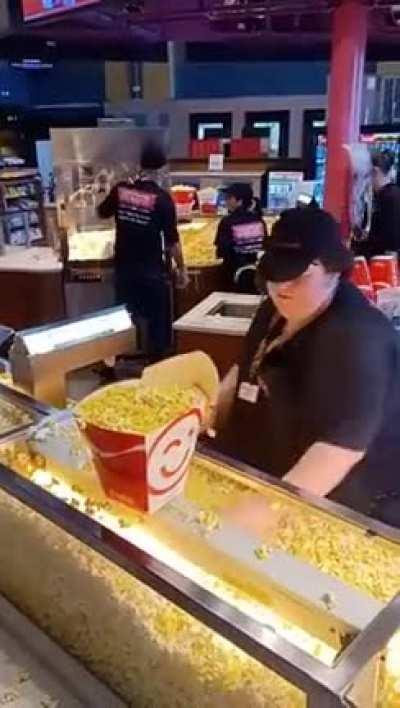 The complex, beautiful artistic choreography of delivering popcorn