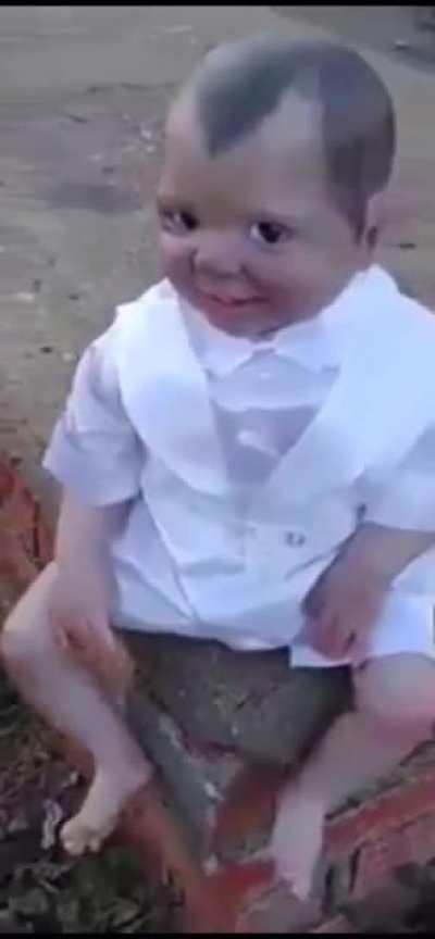 Just a doll chillin at a graveyard