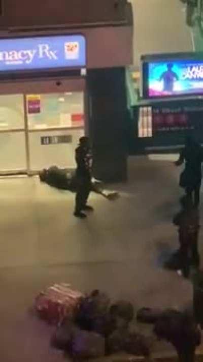 Rioter attacks woman, karma hits