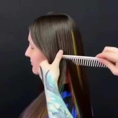 This rainbow coloured hair hidden under her natural hair