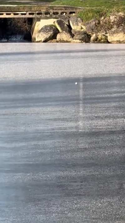 The sound of a golf ball on ice