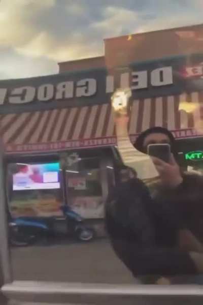 NYC police officer throws up gang signs in an attempt to stir up gang members 