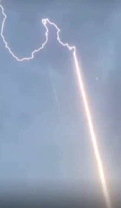 Lightening research center in Florida shooting up a rocket with a string attached into a cloud to induce the lightening.