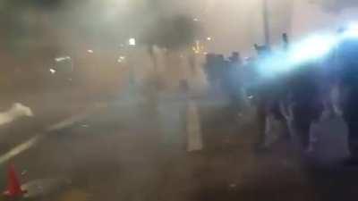 A scene straight out of a dystopian movie from the Portland protests. Federal officers advance as they shoot at and gas protestors.