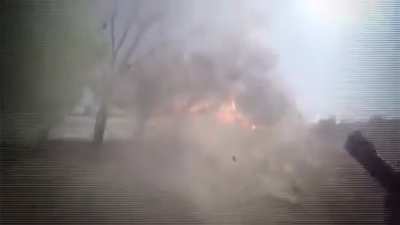 Pov of Iraqi volunteer fighter losing his fingers by shrapnels coming from an isis suicide car bomb that he destroyed with his RPG. 