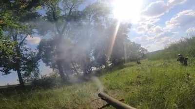 Ukrainian soldiers fire at russian positions