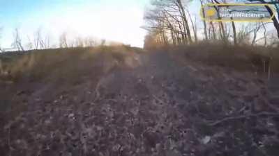 Extended video of wounded Ukrainian soldier stopping a van carrying Ukrainian soldiers, stopping them from running into an ambush. No music.