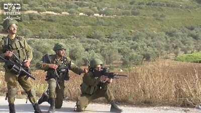 Israeli IDF get excited because they shoot a Palestinian man