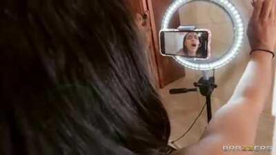 Filming An Online Makeup Tutorial In Her Bathroom