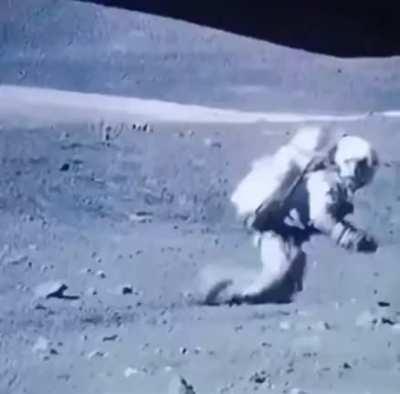 Bloopers from NASA showing astronauts losing their footing while walking on the moon