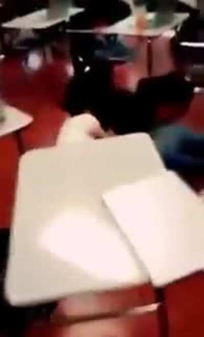 Classroom fight. Starts around 12-13 second mark