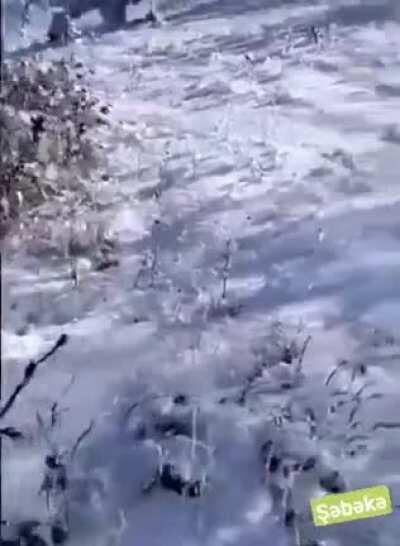 Azerbaijani soldiers fighting against Armenian soldiers