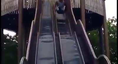 WCGW going down a children's slide