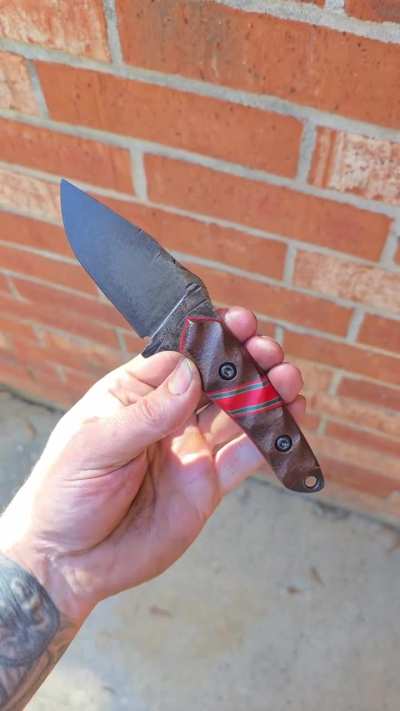 80crv2 Rust Blued finish with Sandblasted Burlap Micarta and G10.