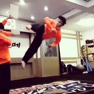 Breaking 3 boards in one jump.