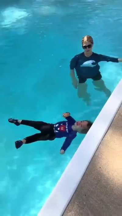 Is this how you teach a kid to swim? Just yeet it into the pool?