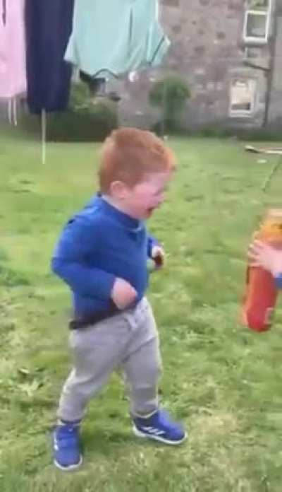 Two bros having a great time sharing a drink
