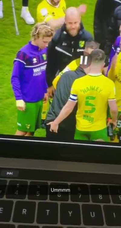 Norwich captain Grant Hanley playing with Kenny McLean's bum during promotion party