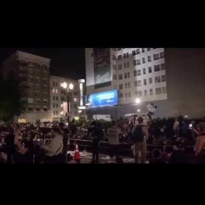 Portland protestors attempt to get Hilton Hotel guest to join them tonight at the rally.