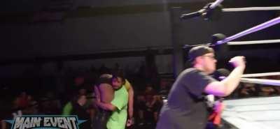 Kylie Rae Carried by event staff after defeat