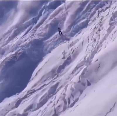 Snowboarding on top of an avalanche