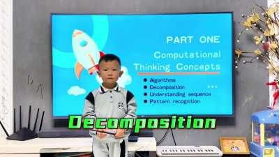 A 4-year-old Chinese kid teaching beginning coding in English