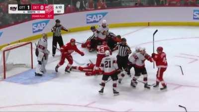 Dylan Larkin collapses after head contact