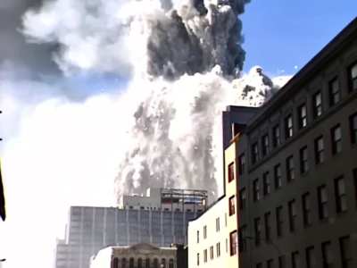 Survivor from the 72nd Floor of WTC1 Interviewed Just as the Same Tower Collapses