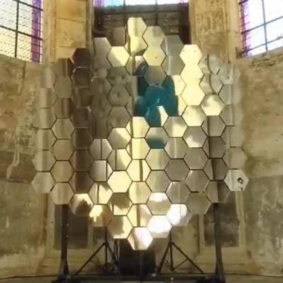 Kinetic sculpture built to mimic water