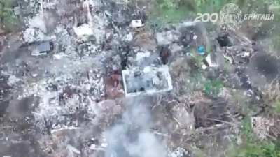 Russian drone grenade drop on a wounded Ukrainian soldier