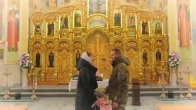 Fighter Oleksa getting married after coming home from a long period of fighting in Bakhmut (where he shared what little food he had with dogs and drank water from heating pipes)
