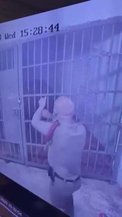 Thai police shot a loaded inmate from outside the holding cell, I think?