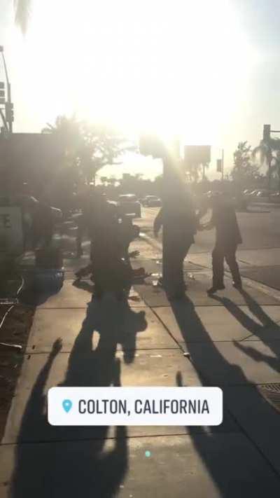 Man tries to attack protesters with axe in Colton, CA.