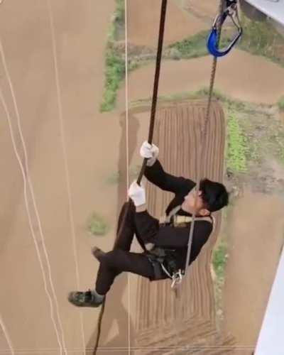 Even though he wears safety gloves but still feel the heat