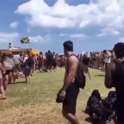 This idiot doing flips almost hitting a rock