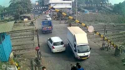 Not stopping for the railway level crossing inspite of warning sounds blaring