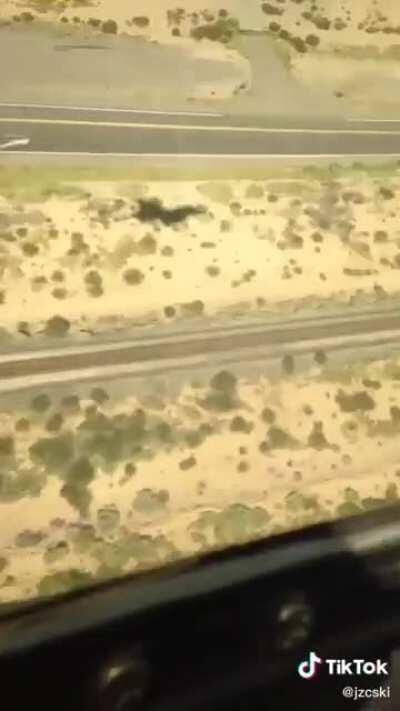 Flying a F-16 low over a highway