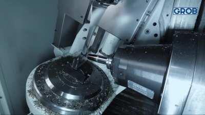 Turbine blade being machined by a 5-axis CNC (Grob G350)