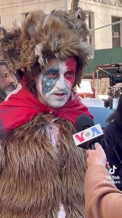 Q is a psyops says this guy in Manhattan today