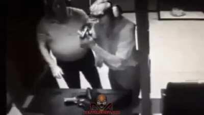 idiot tests his gun by shooting his hand