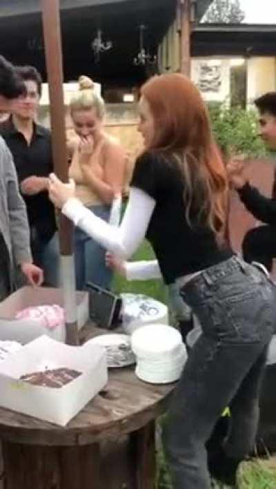 Madelaine Cutting Cake